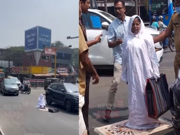 റോഡിന് നടുവിൽ പായ വിരിച്ച് നിസ്കരിച്ച് സ്ത്രീ